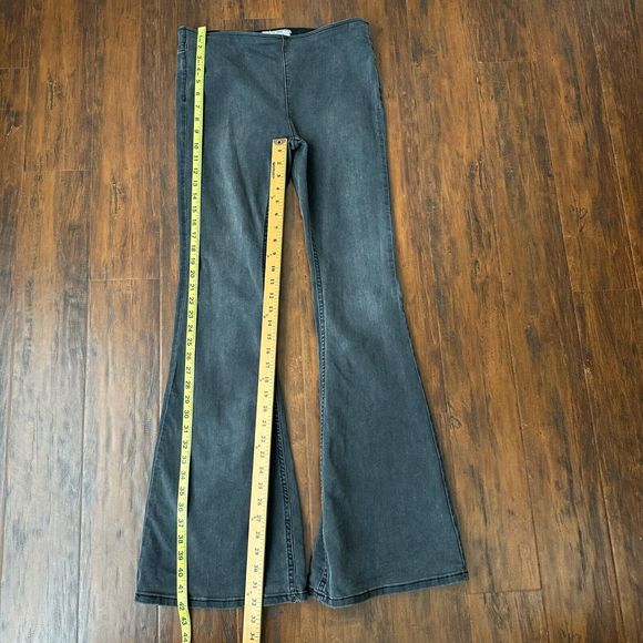 FREE PEOPLE Penny Pull On Flare Jeans in Washed Black - Picture 13 of 13